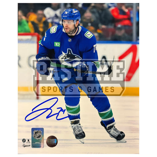 Jake Debrusk Autographed Vancouver Canucks Hockey Photo (Skating 2)