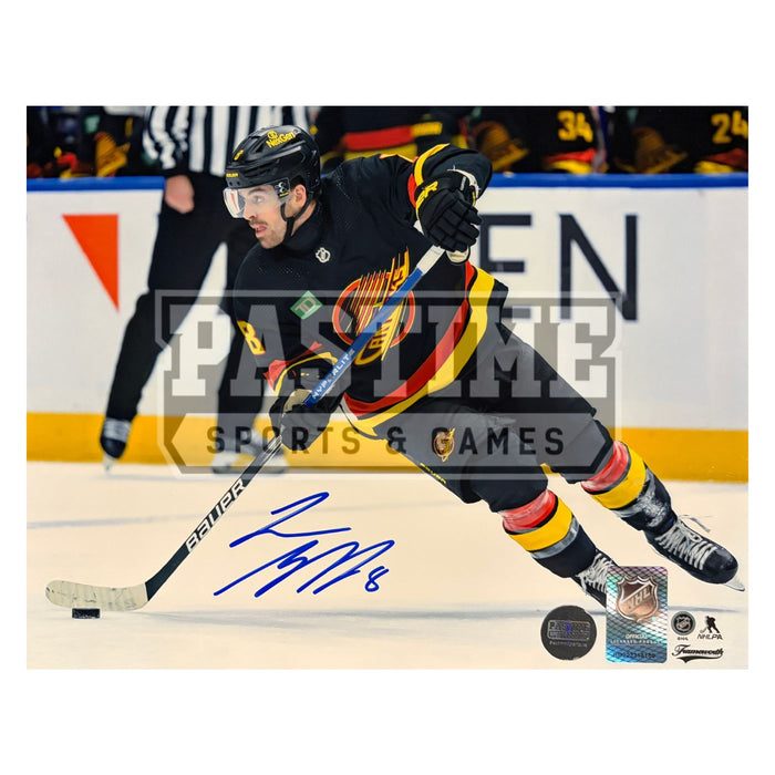 Conor Garland Autographed Vancouver Canucks Hockey Photo (Skating With The Puck 1)