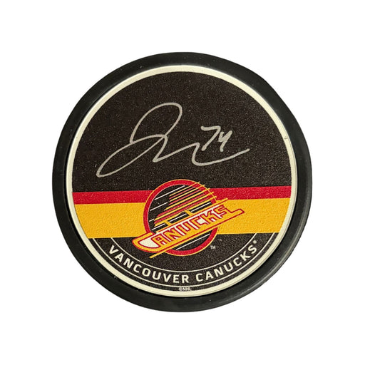 Jake Debrusk Autographed Vancouver Canucks Skate Hockey Textured  Autograph Puck - Pastime Sports & Games