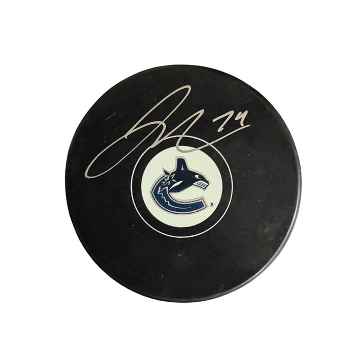 Jake Debrusk Autographed Vancouver Canucks Orca Hockey Puck Small Logo - Pastime Sports & Games