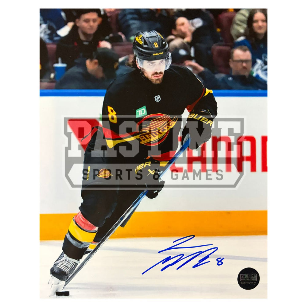 Conor Garland Autographed Vancouver Canucks Hockey Photo (Skating With The Puck 2)