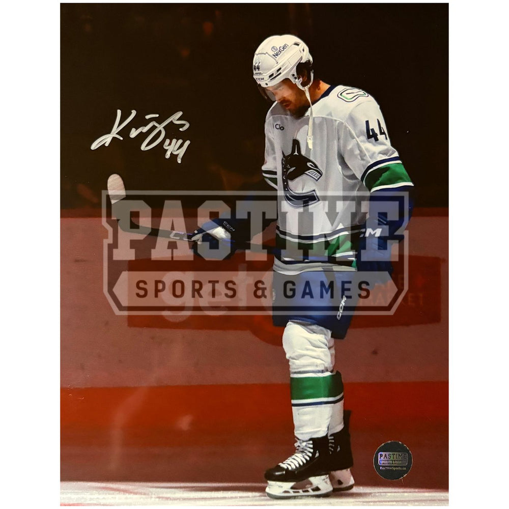 Kiefer Sherwood Autographed Vancouver Canucks Hockey Photo (Standing On Ice)