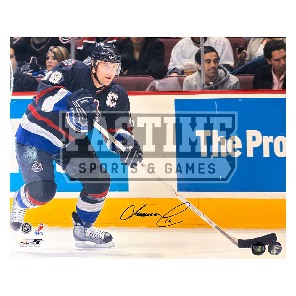 Markus Naslund Autographed Vancouver Canucks Photo (Skating By The Boards) - Pastime Sports & Games