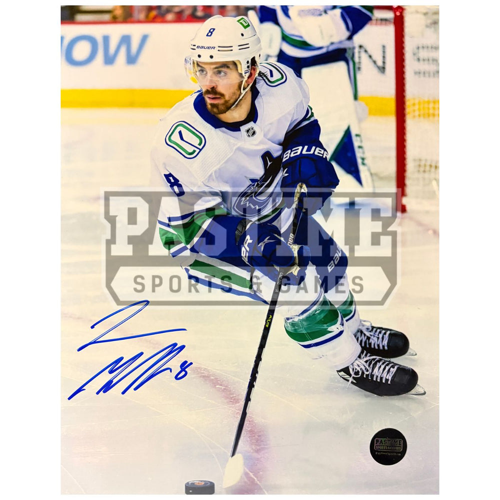 Conor Garland Autographed Vancouver Canucks Hockey Photo (Skating With The Puck 3)