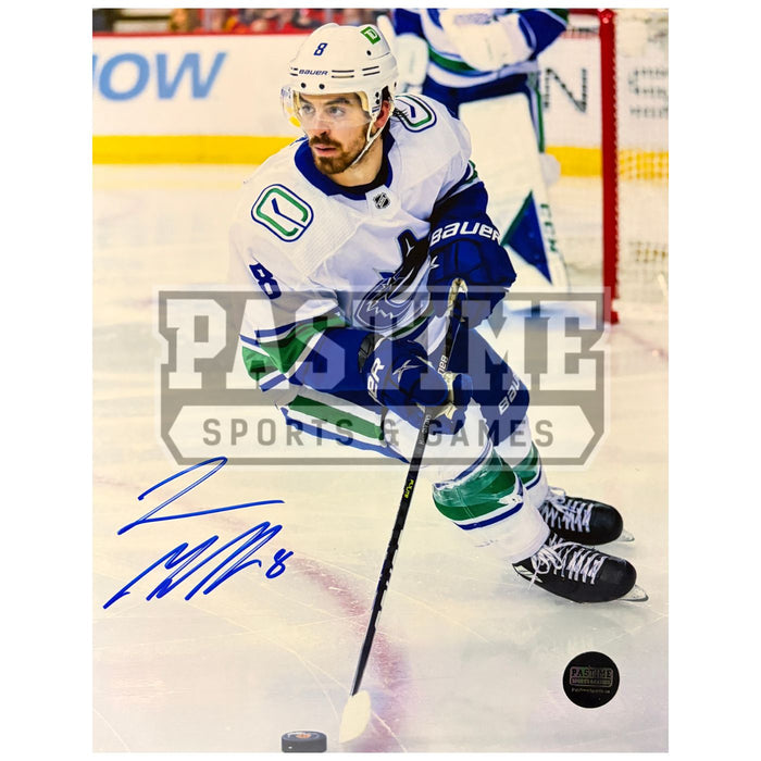 Conor Garland Autographed Vancouver Canucks Hockey Photo (Skating With The Puck 3)