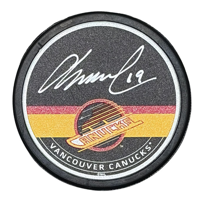 Markus Naslund Autographed Vancouver Canucks Puck (Textured Skate Autograph Puck) - Pastime Sports & Games