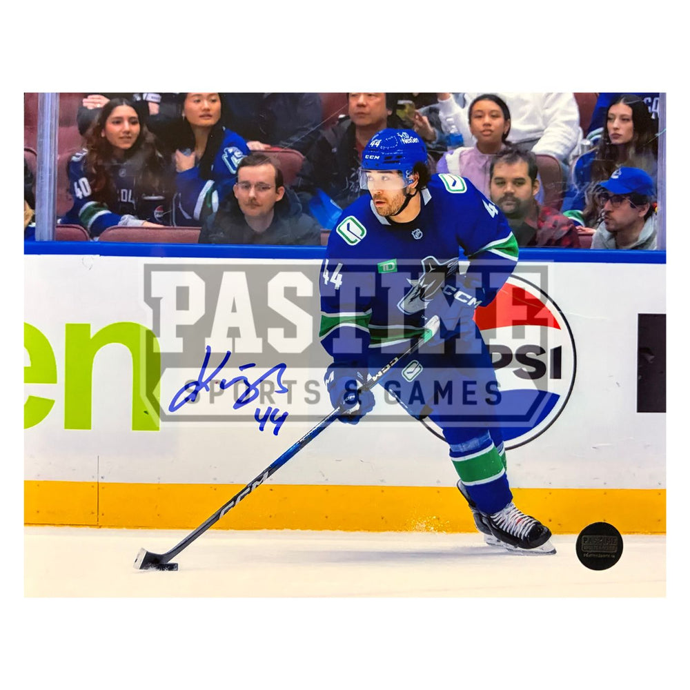 Kiefer Sherwood Autographed Vancouver Canucks Hockey Photo (Skating With The Puck)