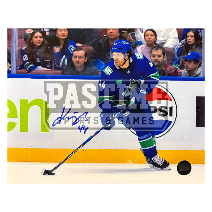Kiefer Sherwood Autographed Vancouver Canucks Hockey Photo (Skating With The Puck)