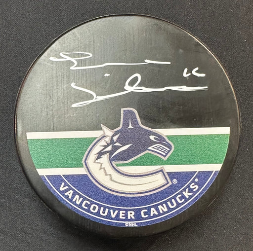 Trevor Linden Autographed Vancouver Canucks Orca Hockey Puck (Printed Mustang Autograph Puck)