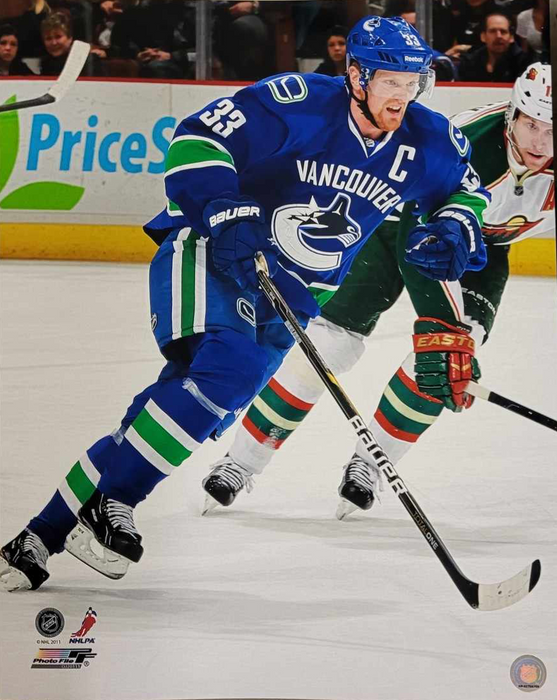 Henrik Sedin 16X20 Vancouver Canucks Home Jersey (Skating With Speed) - Pastime Sports & Games
