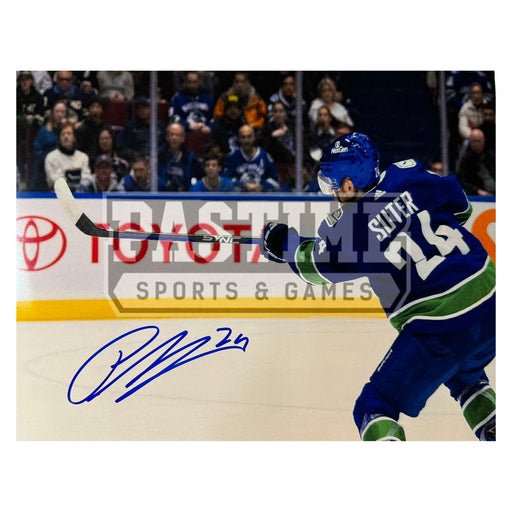 Pius Suter Autographed Vancouver Canucks Photo (Stick Up)