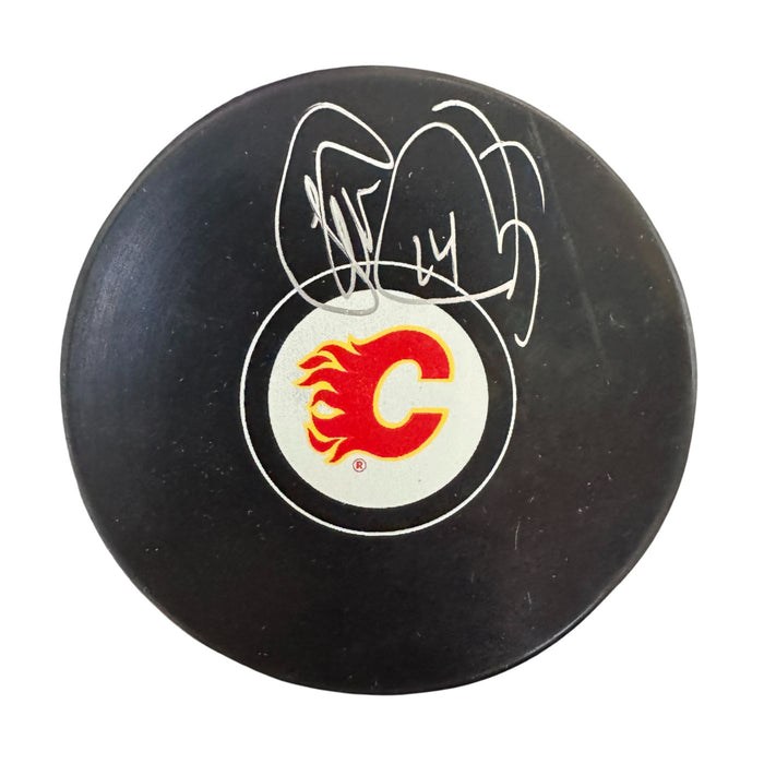 Theoren Fleury Autographed Calgary Flames Hockey Puck (Inglasco Small Logo) - Pastime Sports & Games