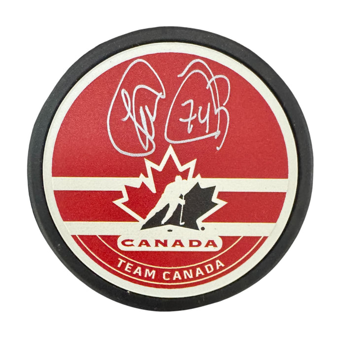 Theoren Fleury Autographed Team Canada Hockey Puck (Mustang Textured) - Pastime Sports & Games