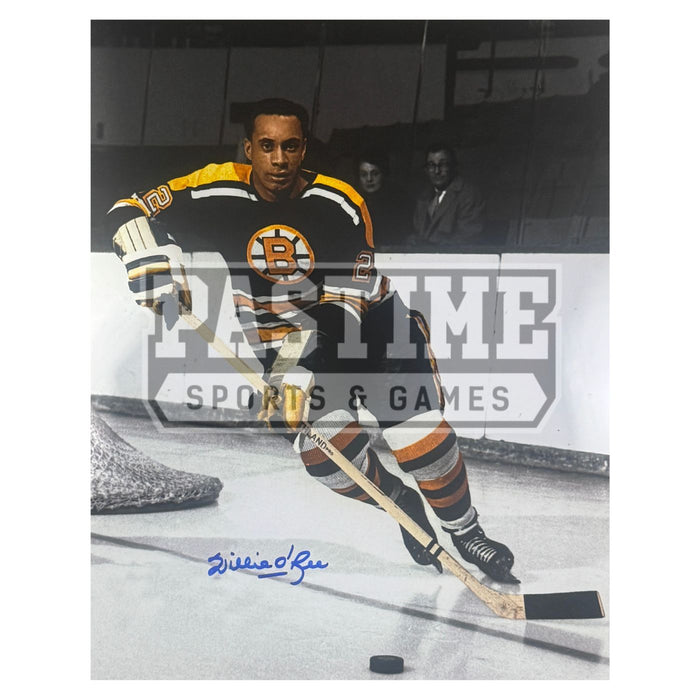 Willie O'Ree Autographed Boston Bruins Photo (Behind Net With Puck) - Pastime Sports & Games