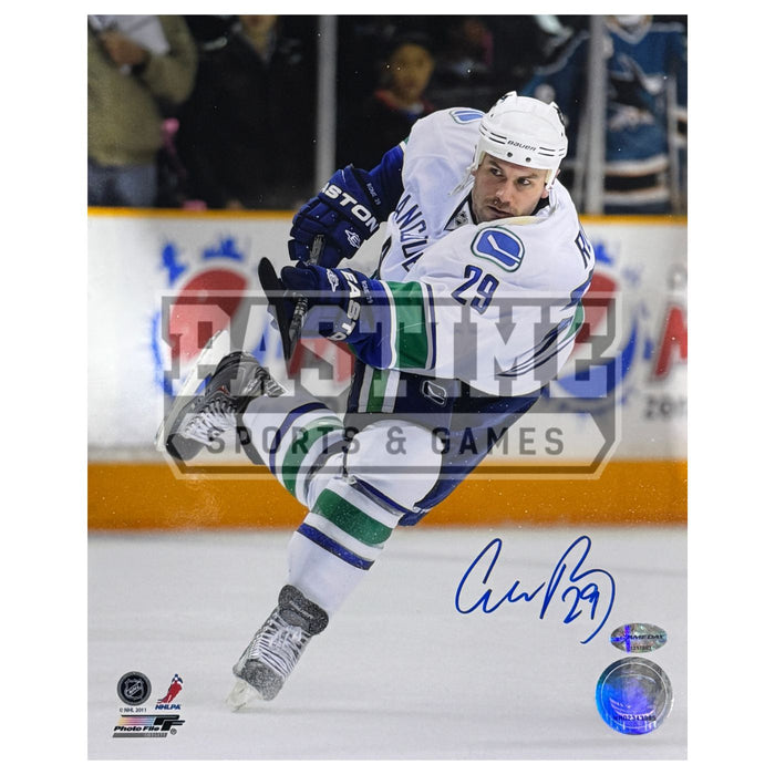 Aaron Rome Autographed Vancouver Canucks Photo (Shooting Puck) - Pastime Sports & Games