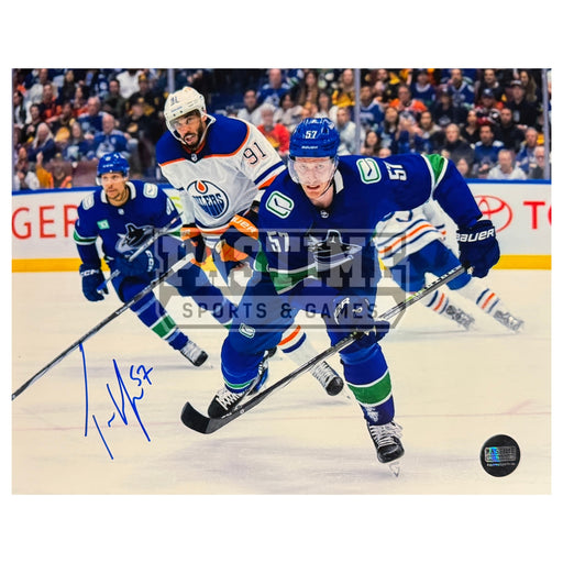 Tyler Myers Autographed Vancouver Canucks Photo (Charging)