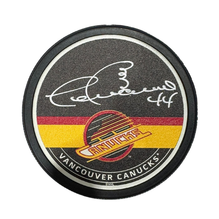 Dave Babych Autographed Vancouver Canucks Skate Hockey Puck (Textured Mustang Autograph Puck)