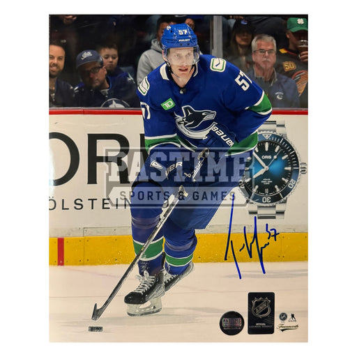 Tyler Myers Autographed Vancouver Canucks Photo (With Puck)