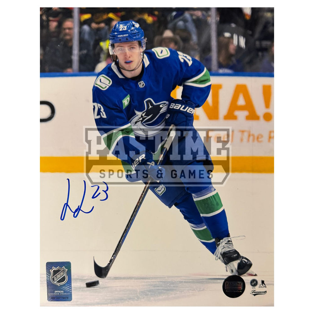 Jonathan Lekkerimaki Autographed Vancouver Canucks Photo (Skating With Puck) - Pastime Sports & Games