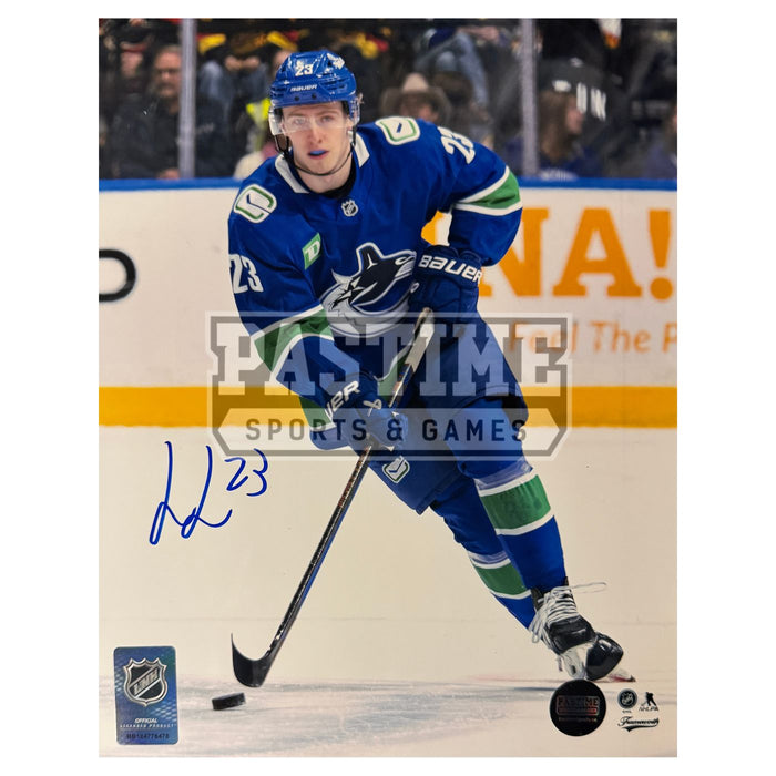 Jonathan Lekkerimaki Autographed Vancouver Canucks Photo (Skating With Puck) - Pastime Sports & Games