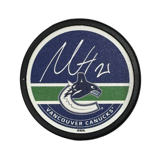 Nils Höglander Autographed Vancouver Canucks Orca Hockey Puck (Textured Mustang Autograph Puck)