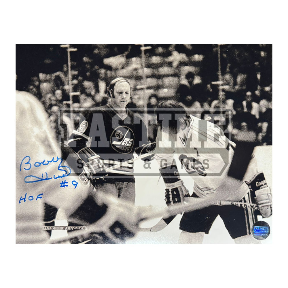 Bobby Hull Autographed Winnipeg Jets Photo (Looking At Chicago Cougars Player) - Pastime Sports & Games