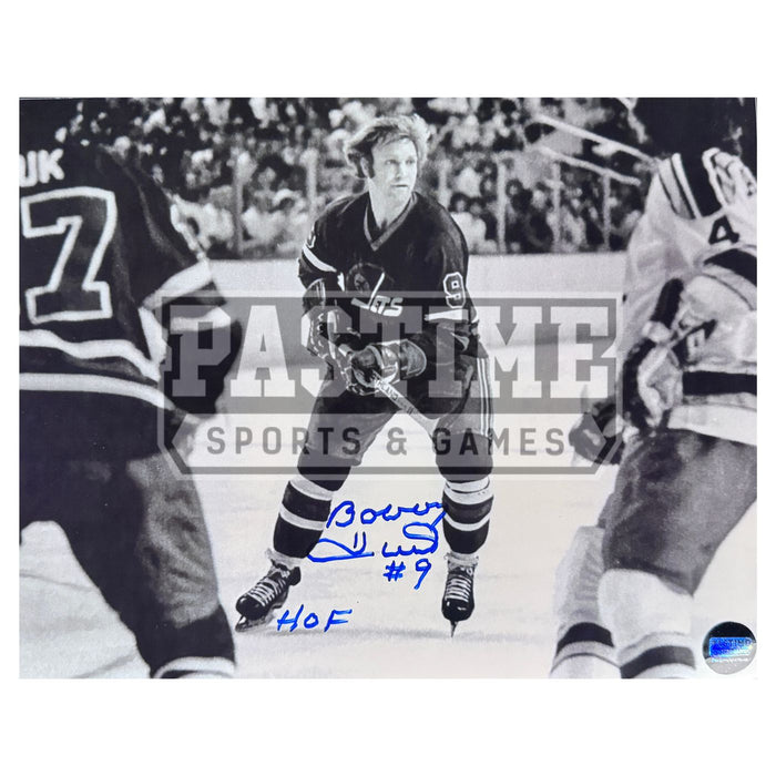 Bobby Hull Autographed Winnipeg Jets Photo (Looking For The Puck) - Pastime Sports & Games