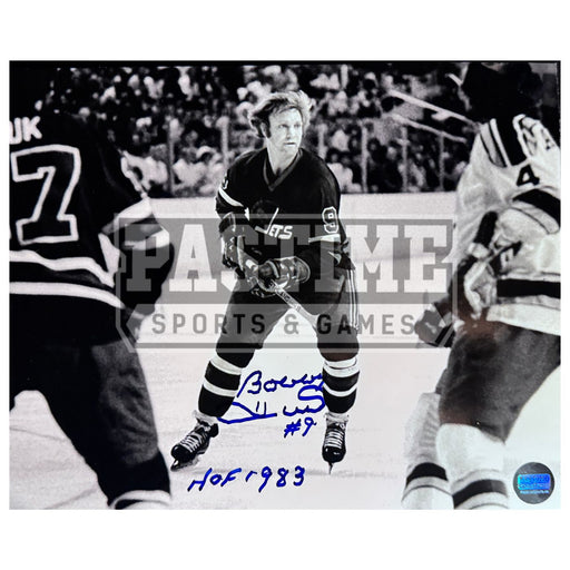 Bobby Hull Autographed Winnipeg Jets Photo (Looking For The Puck) - Pastime Sports & Games
