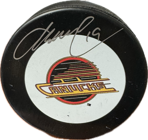 Markus Naslund Autographed Vancouver Canucks Puck (Large Skate Logo) - Pastime Sports & Games
