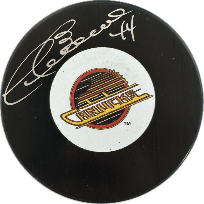 Dave Babych Autographed Vancouver Canucks Hockey Puck (Small Skate Logo) - Pastime Sports & Games