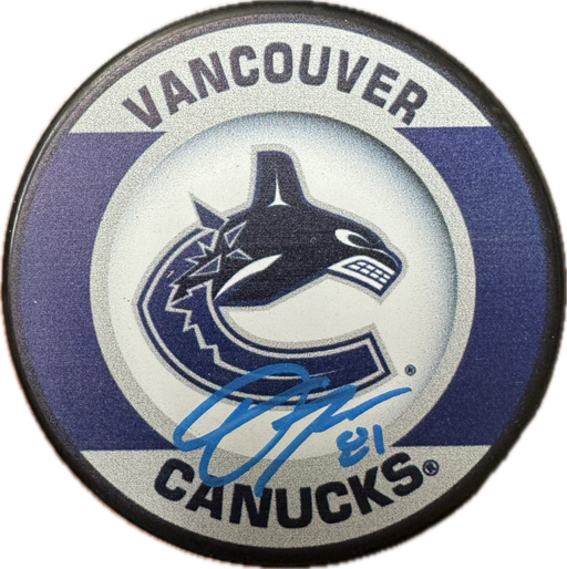 Dakota Joshua Autographed Vancouver Canucks Hockey Puck (Vancouver Canucks) - Pastime Sports & Games