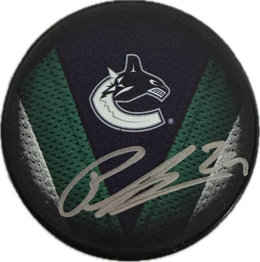 Pius Suter Autographed Vancouver Canucks Hockey Puck (Jersey V) - Pastime Sports & Games