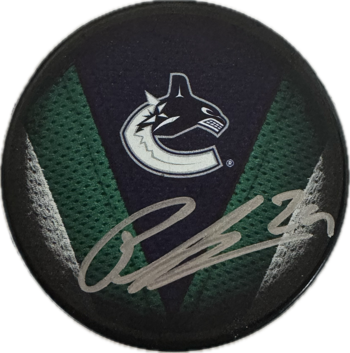 Pius Suter Autographed Vancouver Canucks Hockey Puck (Jersey V) - Pastime Sports & Games