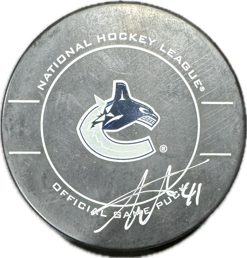 Andrew Alberts Autographed Vancouver Canucks Hockey Puck (Official Game Puck)