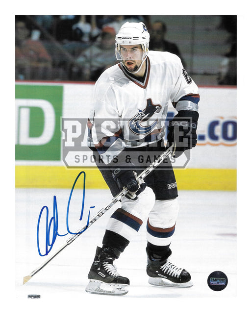 Adrian Aucoin Autographed 8X10 Magazine Page Vancouver Canucks Away Jersey (In Position) - Pastime Sports & Games