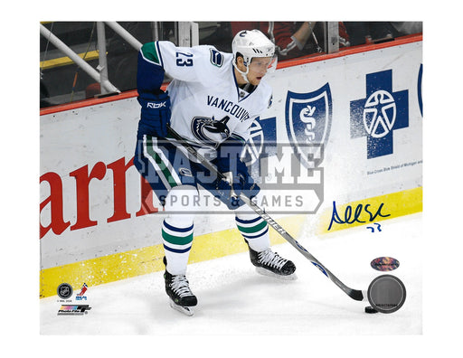 Alexander Edler Autographed 8X10 Vancouver Canucks Away Jersey (Skating With Puck) - Pastime Sports & Games