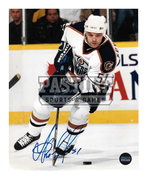 Andrei Kovolanko Autographed 8X10 Edmonton Oilers Away Jersey (Skating With Puck) - Pastime Sports & Games
