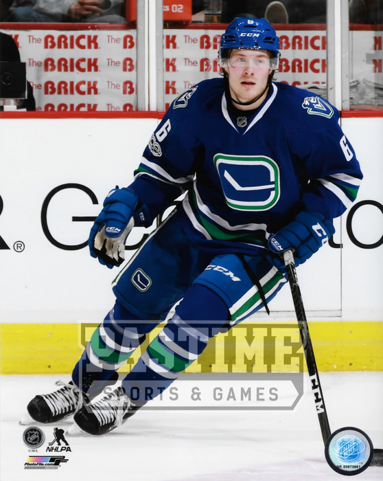 Brock Boeser 8X10 Canucks Home Jersey (Skating One Hand On Stick) - Pastime Sports & Games
