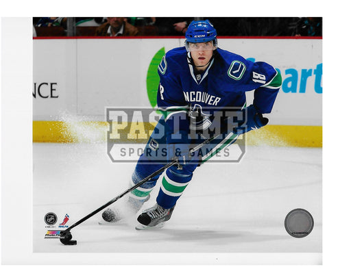 Chris Tanev 8X10 Vancouver Canucks Home Jersey (Skating With Puck) - Pastime Sports & Games