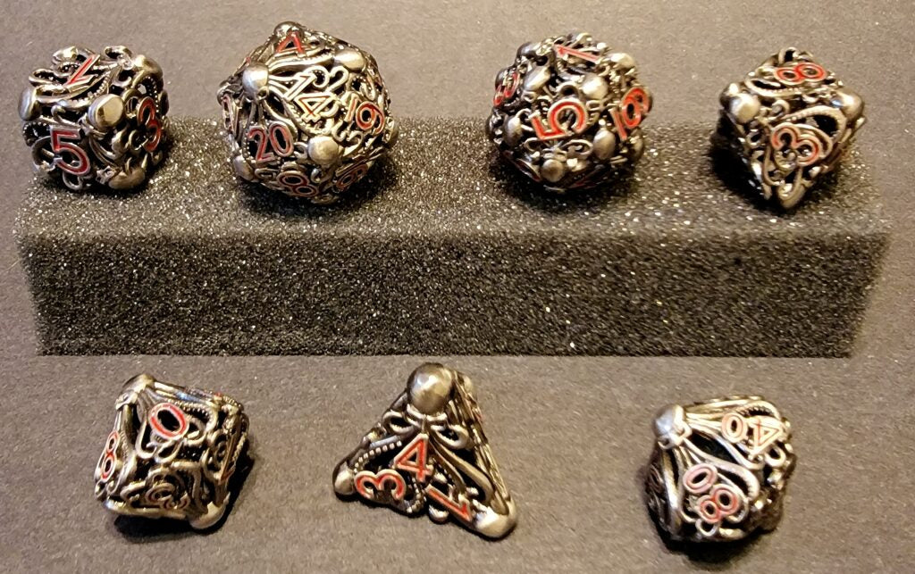 7pc RPG Hollow Metal Dice Set - Cthulhu's Grip Silver/Red - Pastime Sports & Games