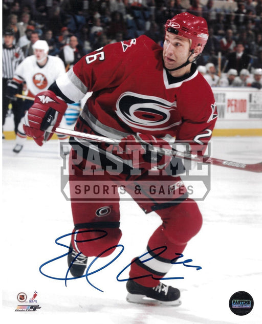 Eric Cole Autographed 8X10 Carolin Hurricains Home Jersey (Skating) - Pastime Sports & Games