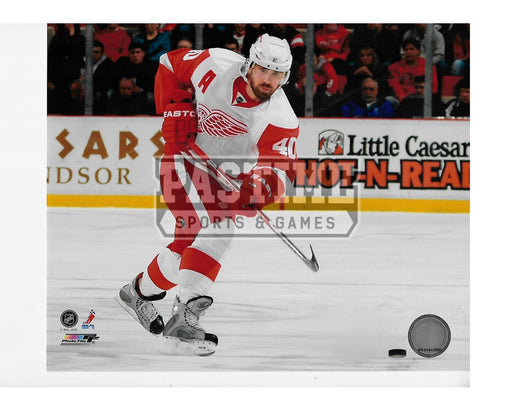 Henrik Zetterberg 8X10 Detroit Red Wings Away Jersey (Skating With Puck) - Pastime Sports & Games