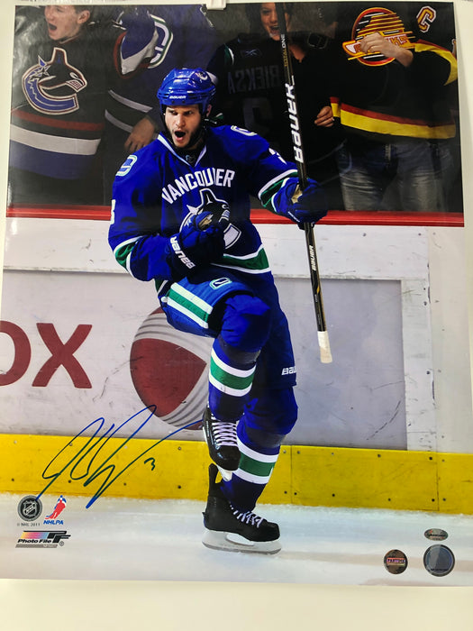Kevin Bieksa Autographed 16X20 Home Jersey (Just scored) - Pastime Sports & Games