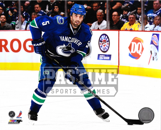 Jason Garrisson 8X10 Canucks Home Jersey Hockey (Skatinng With Puck) - Pastime Sports & Games