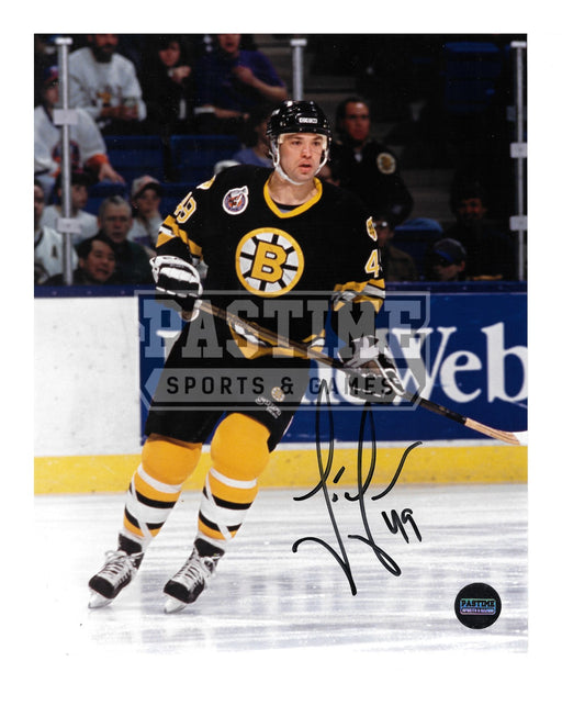 Joe Juneau Autographed 8X10 Boston Bruins Home Jersey (Skating) - Pastime Sports & Games