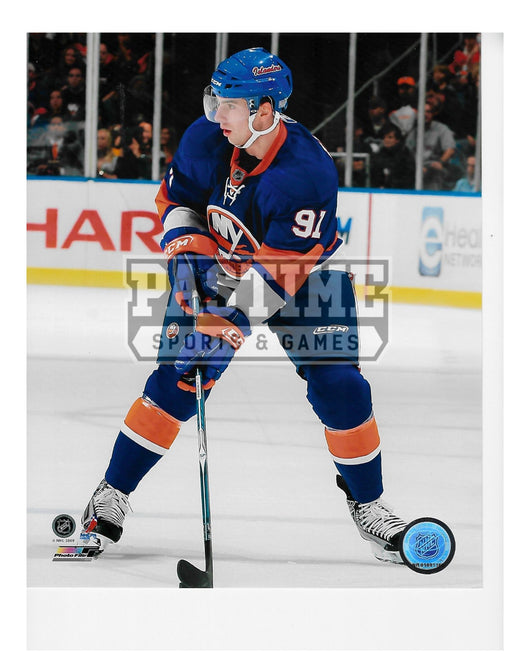 John Tavares 8X10 New York Islanders Home Jersey (Ready With Puck) - Pastime Sports & Games