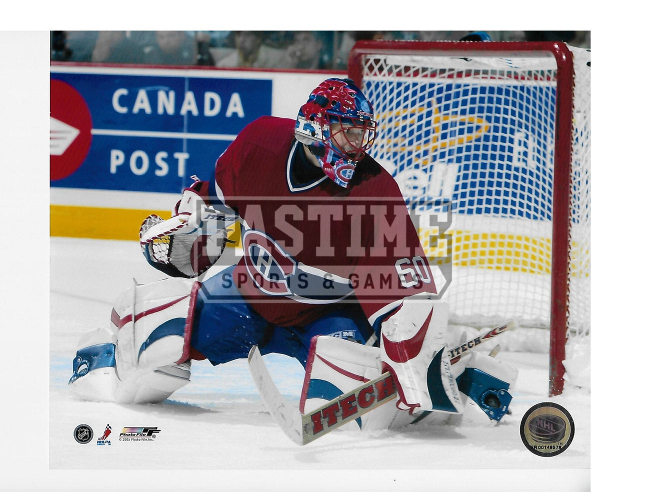Jose Theodore 8X10 Montreal Canadians Home Jersey (Saving Puck) - Pastime Sports & Games