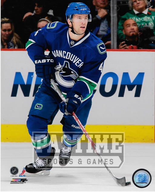 Keith Ballard 8X10 Canucks Home Jersey (Skating With Puck) - Pastime Sports & Games