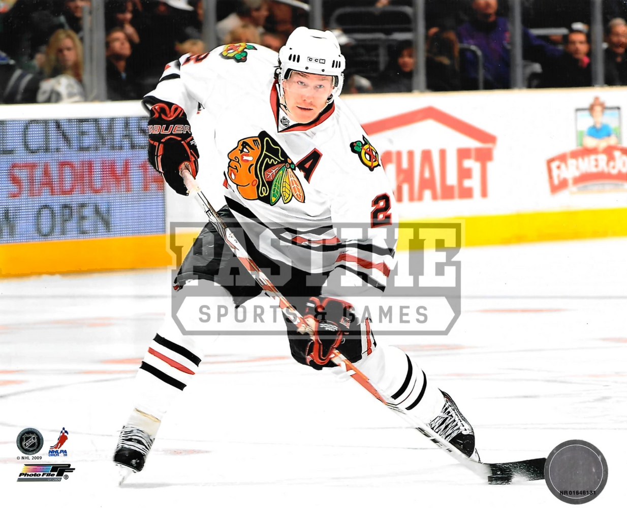 Duncan Keith 8X10 Chicago Blackhawks Away Jersey (Shooting Puck) - Pastime Sports & Games