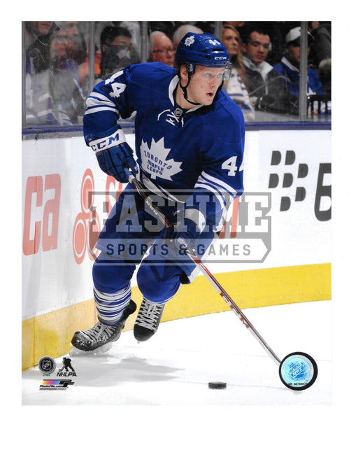 Morgan Rielly 8X10 Toronto Maple Leafs Home Jersey (Skating With Puck) - Pastime Sports & Games